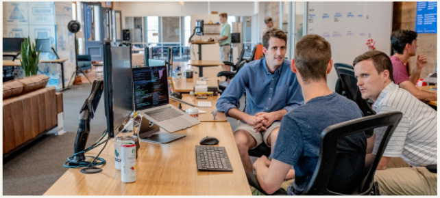 employees having group discussion